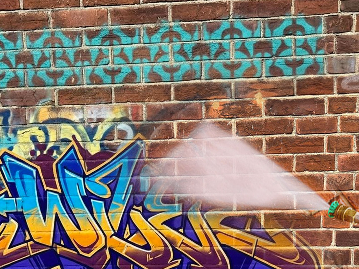 Graffiti Removal before treatment, Raw Power Exterior Cleaning